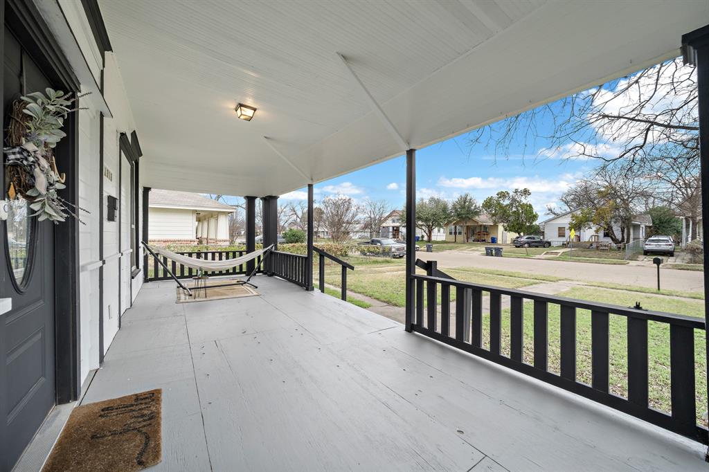 1916 Mitchell Avenue Waco, TX 76708 - Photo 15 of 32 a view of a porch with wooden floor and fence