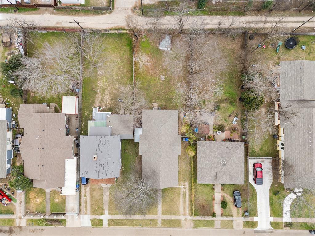1916 Mitchell Avenue Waco, TX 76708 - Photo 7 of 32 an aerial view of residential houses with outdoor space