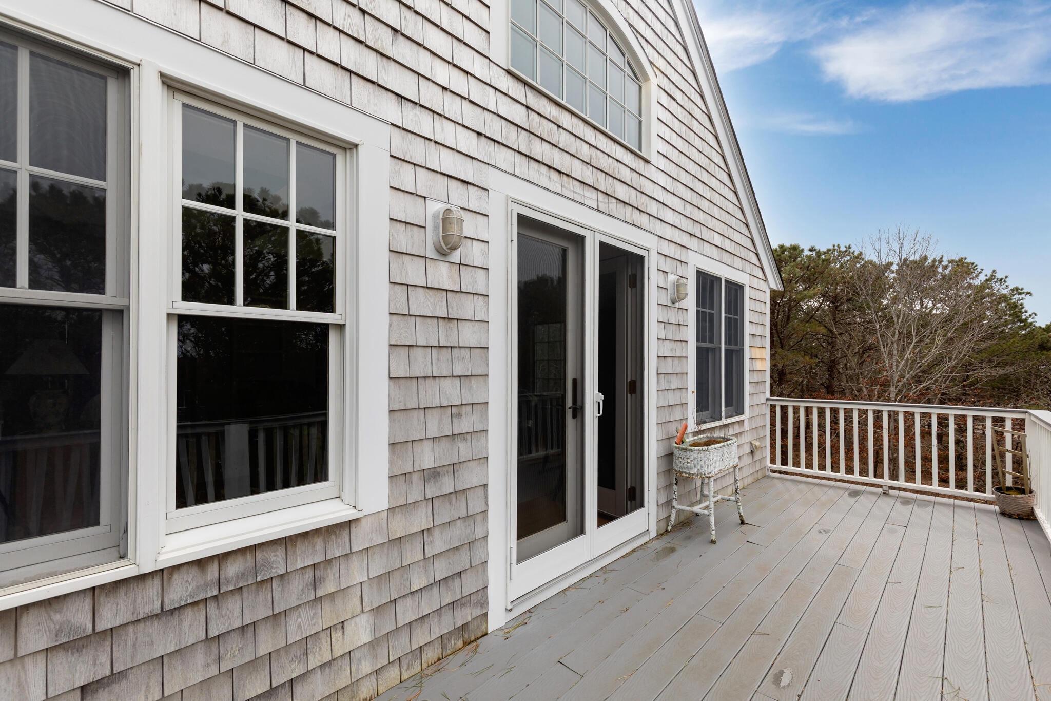 311 South Sunken Meadow Road Eastham, MA 02642 - Photo 38 of 57 a view of a house with a porch