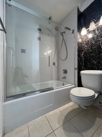 wooden floor in a hall with an entryway