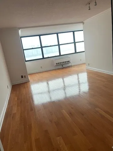 a view of a city with tall buildings