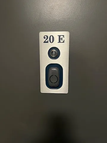 a close up of a wall with a utility and dryer