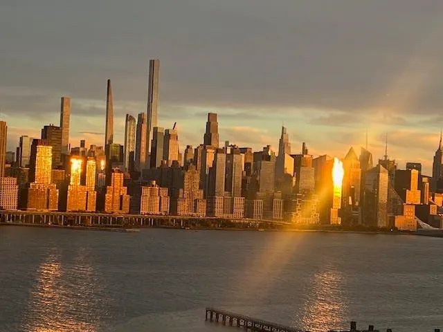 a view of a city with tall buildings