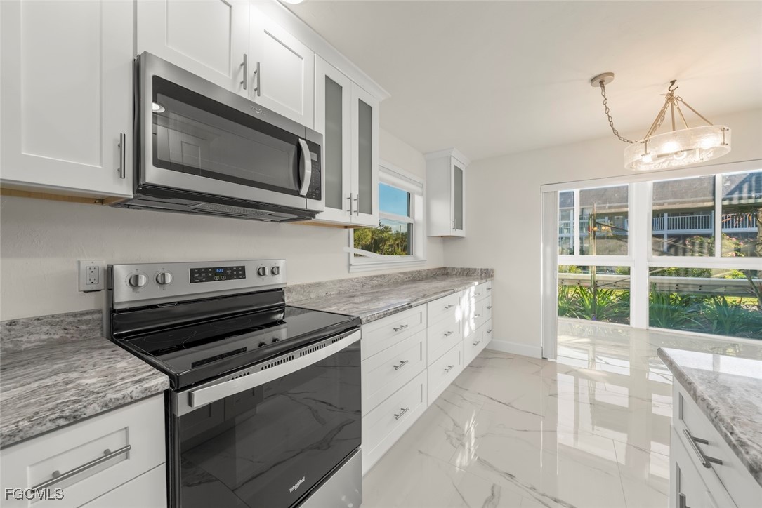 561 Periwinkle Way, Unit E4 Sanibel, FL 33957 - Photo 11 of 32