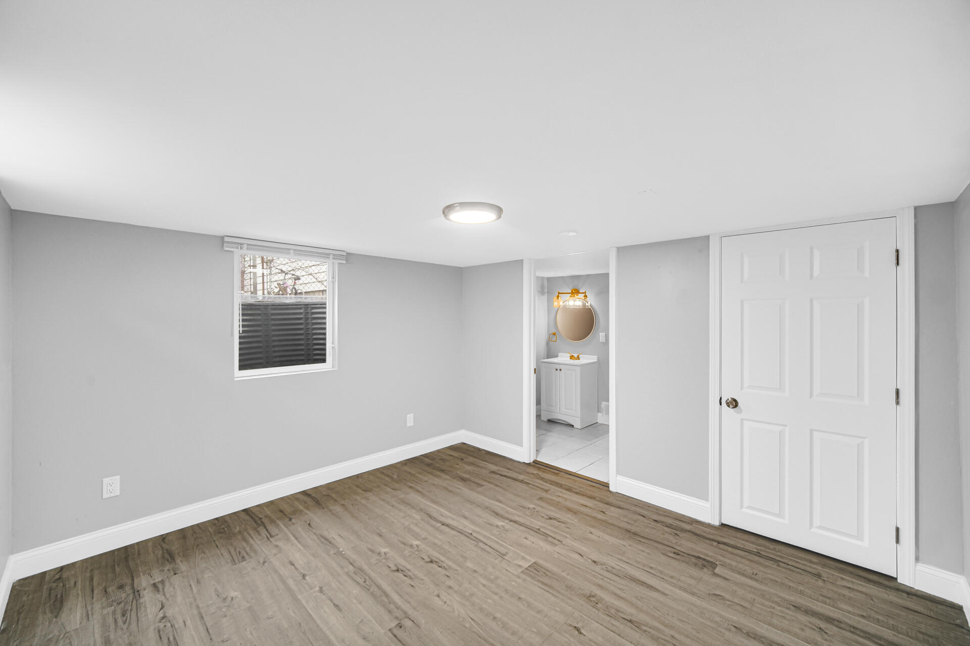 699 State Street Gary, IN 46403 - Photo 19 of 24 a view of an empty room with wooden floor