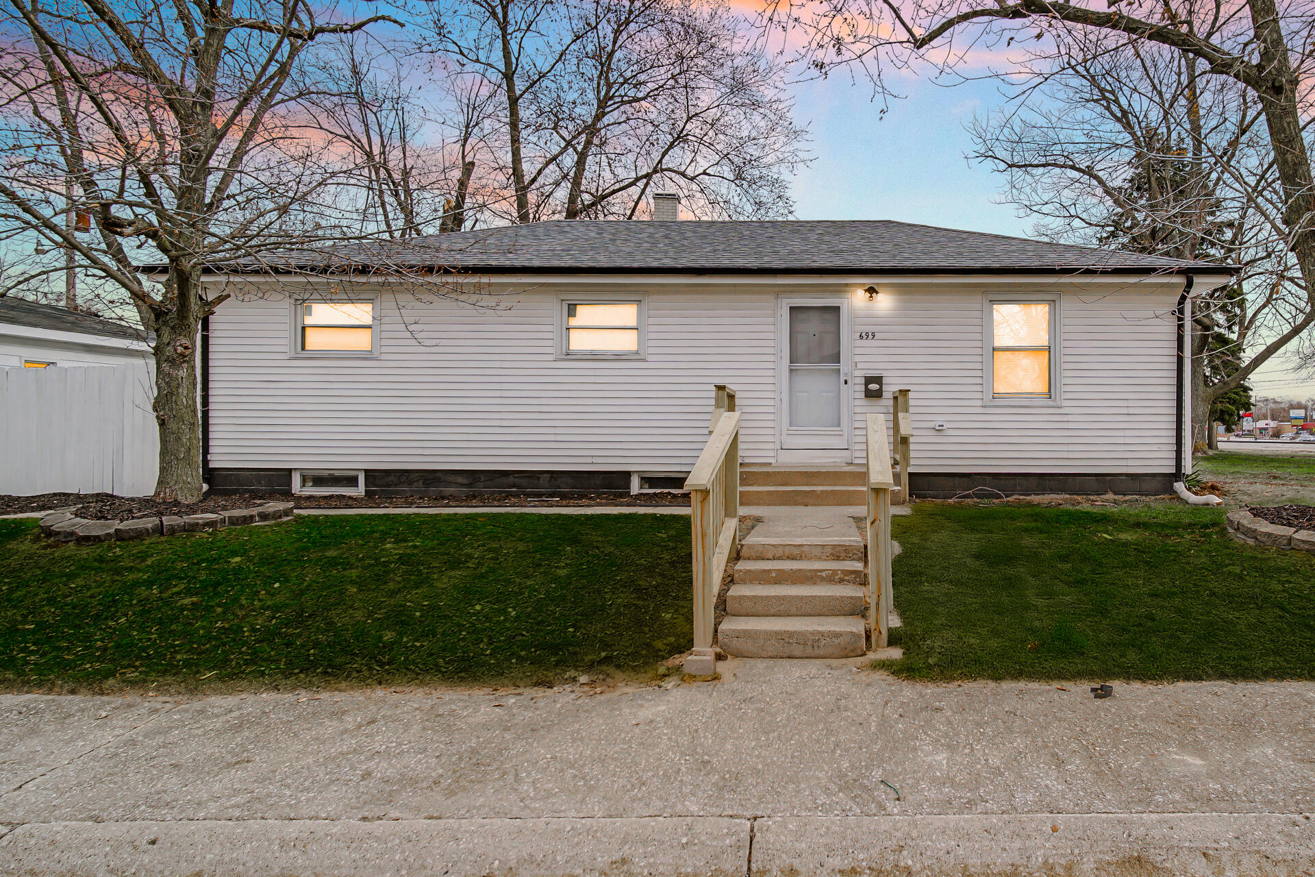 699 State Street Gary, IN 46403 - Photo 2 of 24 a view of a house with a yard
