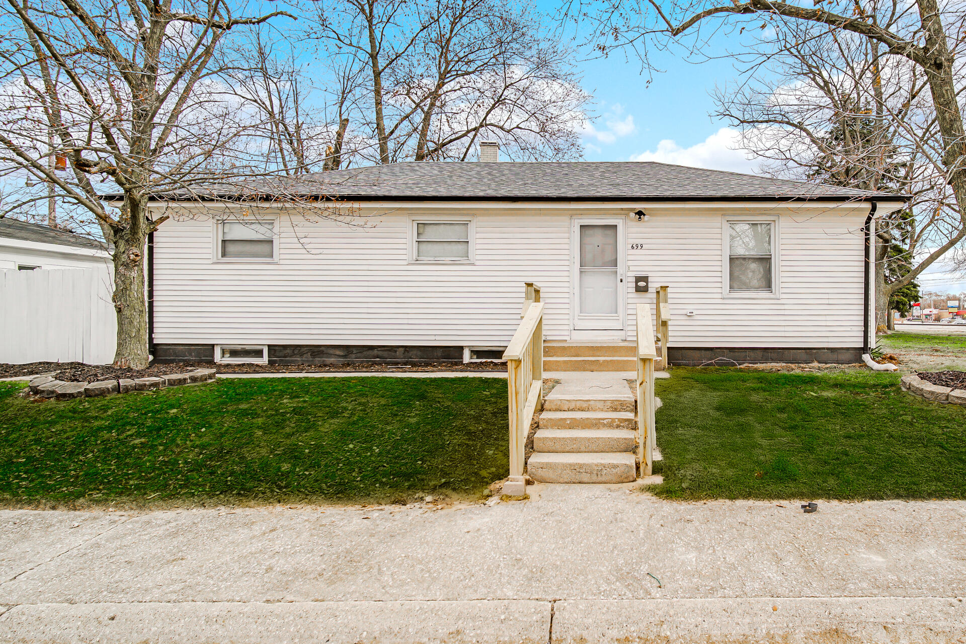 699 State Street Gary, IN 46403 - Photo 3 of 24 a view of a house with a yard