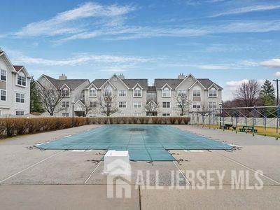 31 Edinburgh Court Edison, NJ 08820 - Photo 2 of 25 an aerial view of residential houses with outdoor space and trees