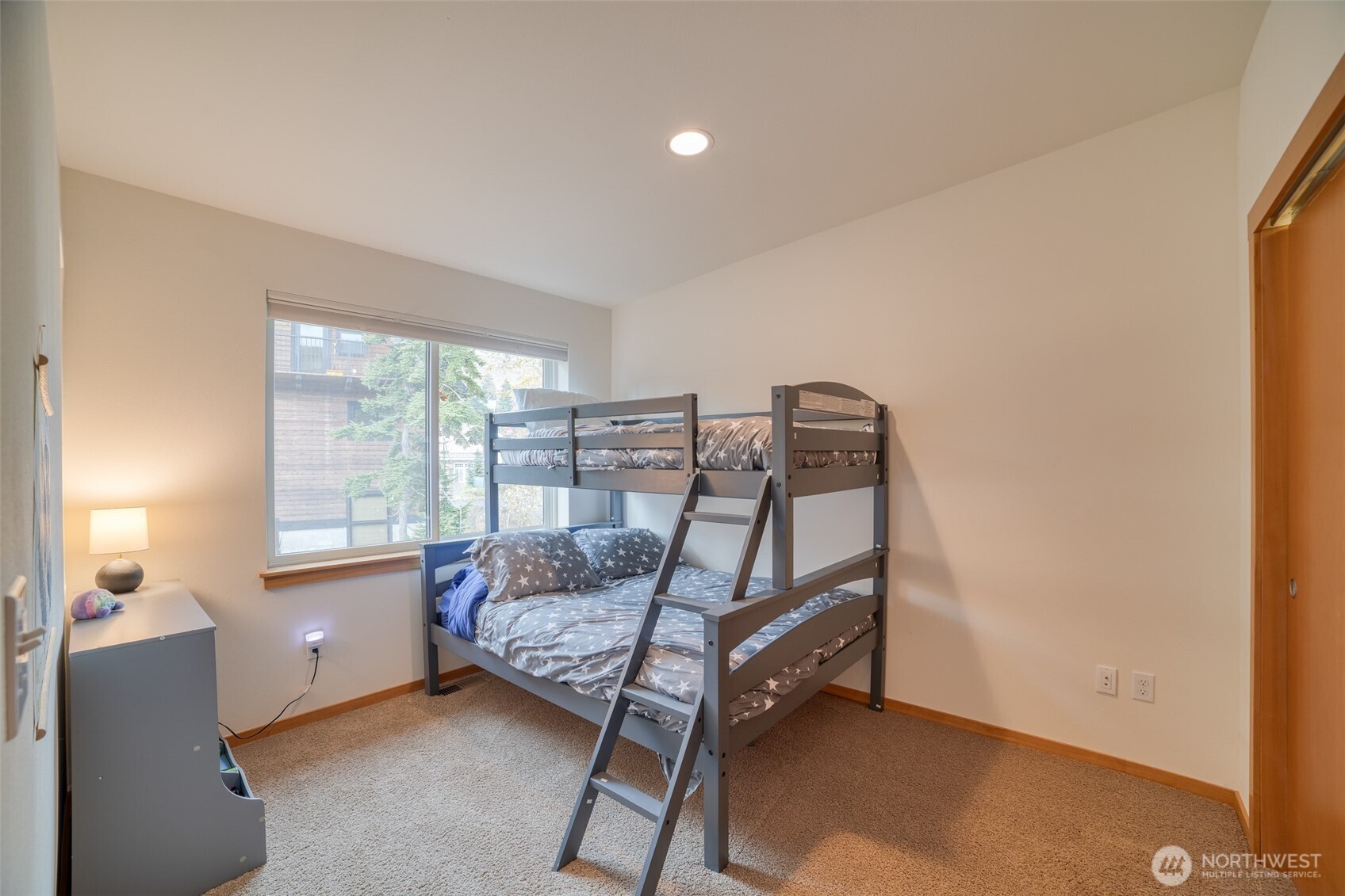 200 Pass Life Way, Unit 1 Snoqualmie Pass, WA 98068 - Photo 11 of 27 a bed room with furniture and window