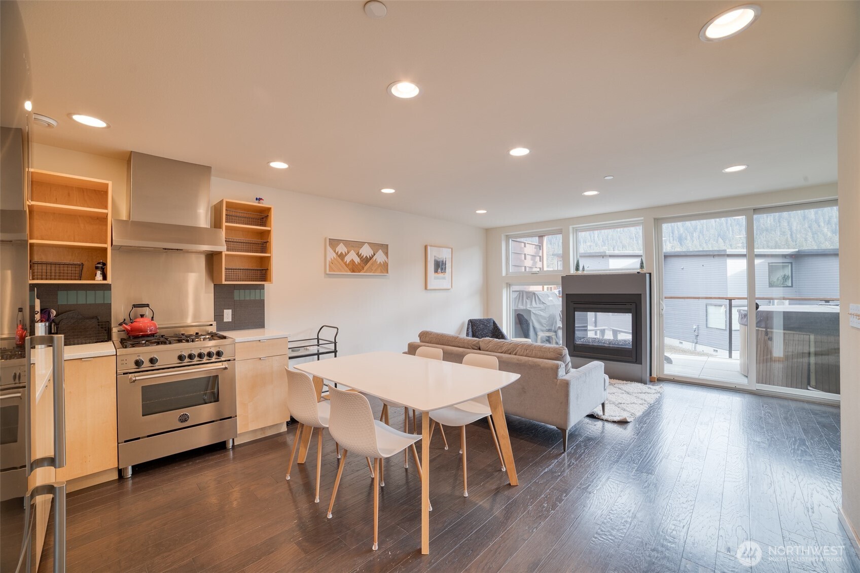 200 Pass Life Way, Unit 1 Snoqualmie Pass, WA 98068 - Photo 6 of 27 a kitchen with a table and chairs in it