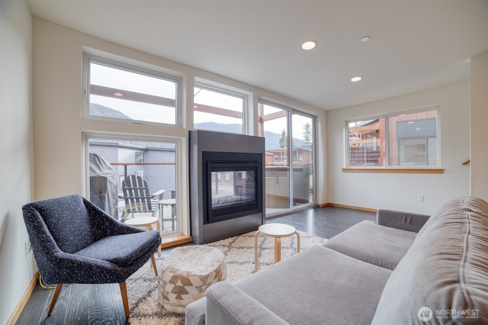 200 Pass Life Way, Unit 1 Snoqualmie Pass, WA 98068 - Photo 8 of 27 a living room with furniture and a fireplace