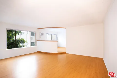 a view of a room with a window