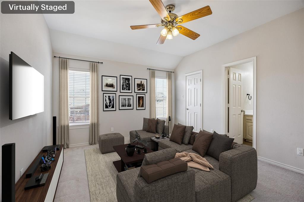 3703 Trailwood Drive Richardson, TX 75082 - Photo 29 of 40 a living room with furniture and a flat screen tv