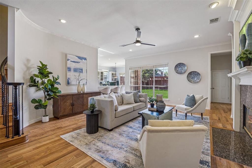 3703 Trailwood Drive Richardson, TX 75082 - Photo 5 of 40 a living room with furniture potted plant and a window