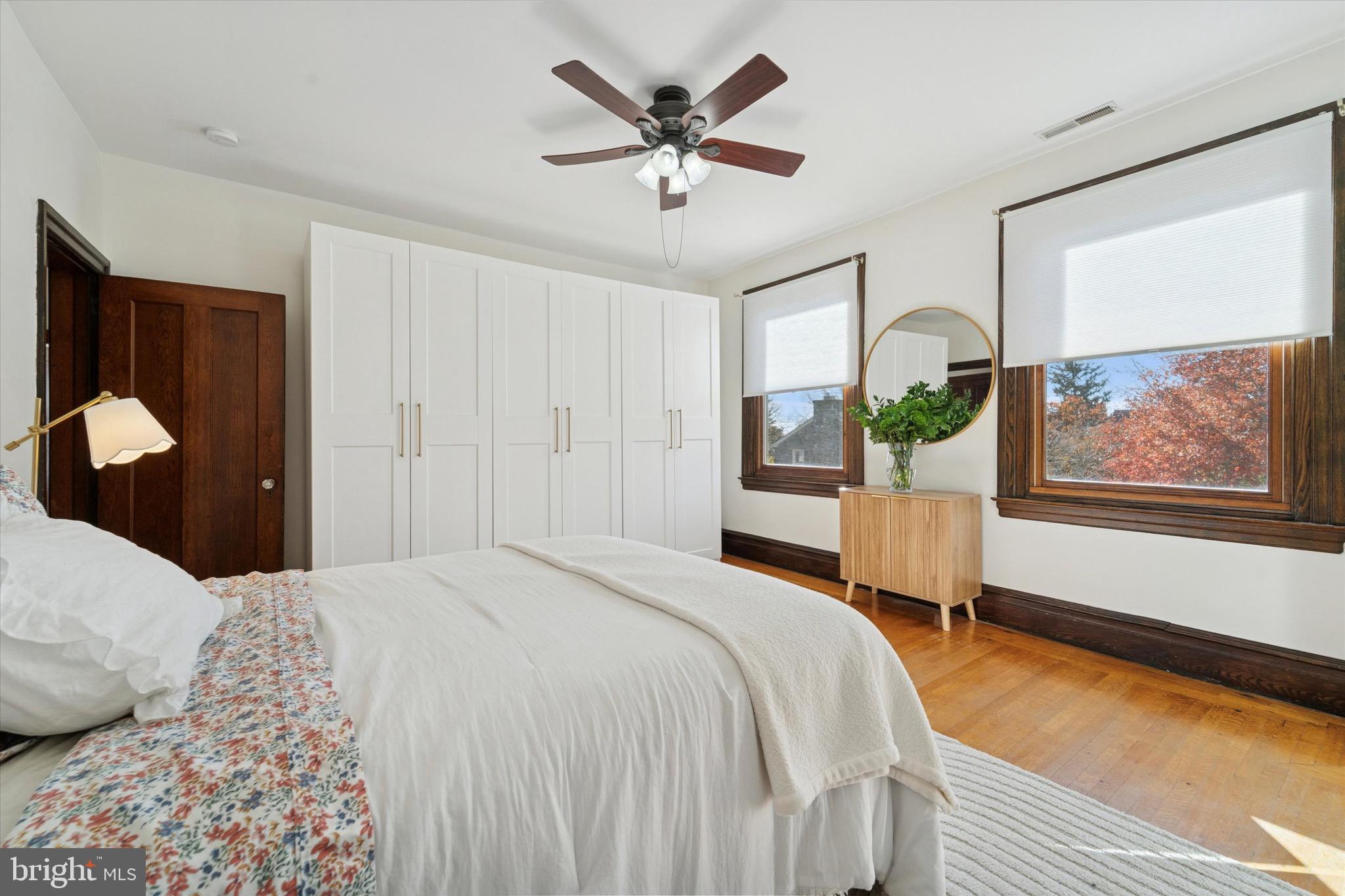 204 East Manoa Road Havertown, PA 19083 - Photo 34 of 80 a bedroom with a bed and a painting on the wall