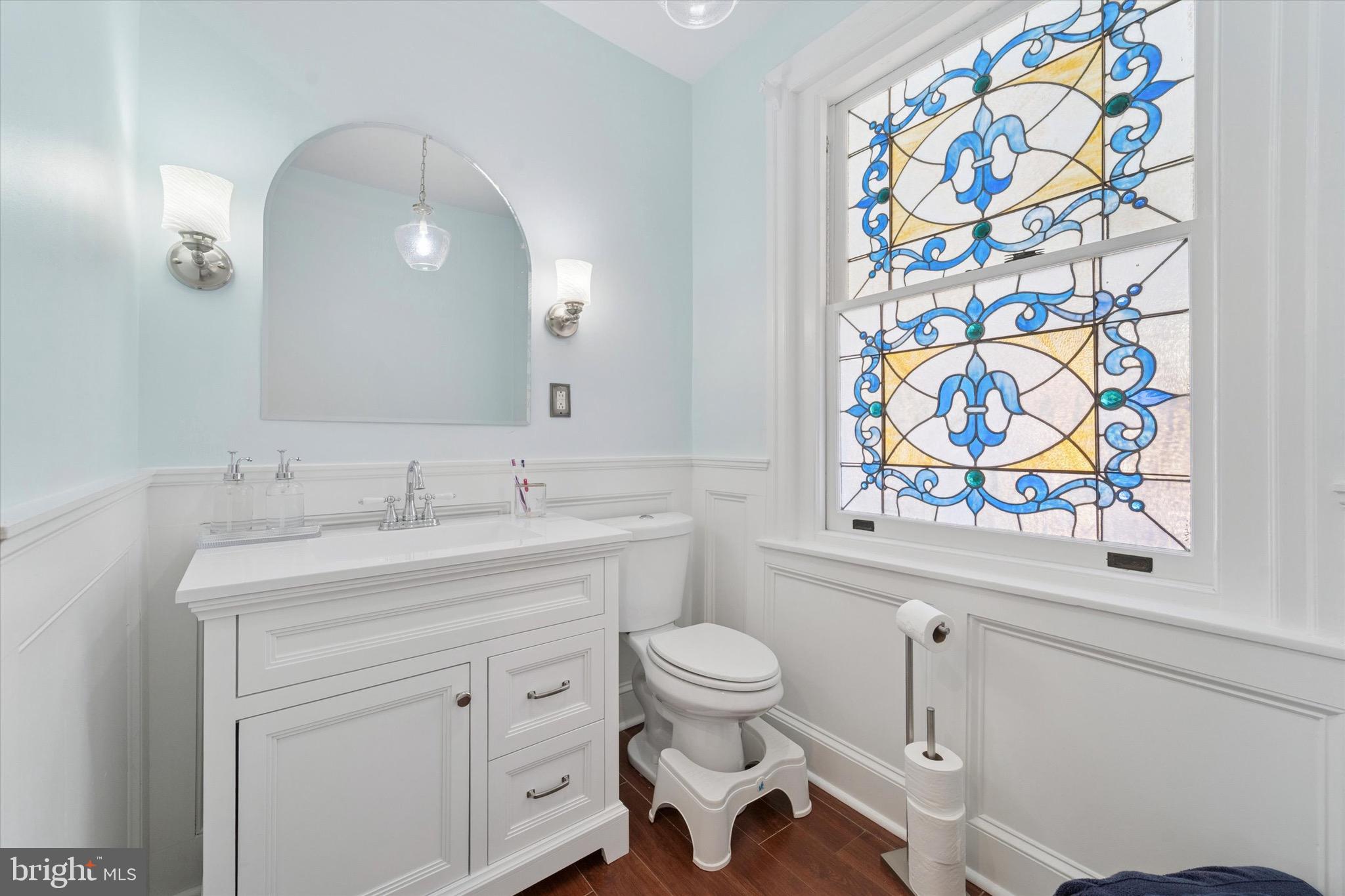 204 East Manoa Road Havertown, PA 19083 - Photo 35 of 80 a bathroom with a sink toilet and a mirror