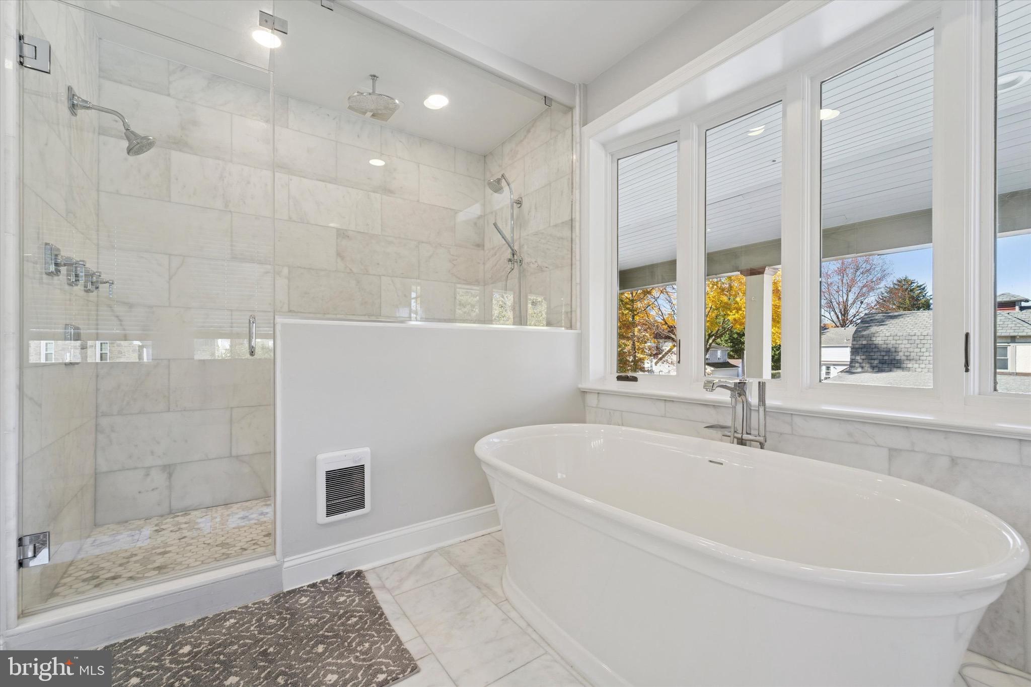 204 East Manoa Road Havertown, PA 19083 - Photo 43 of 80 a white bath tub sitting next to a bathroom sink