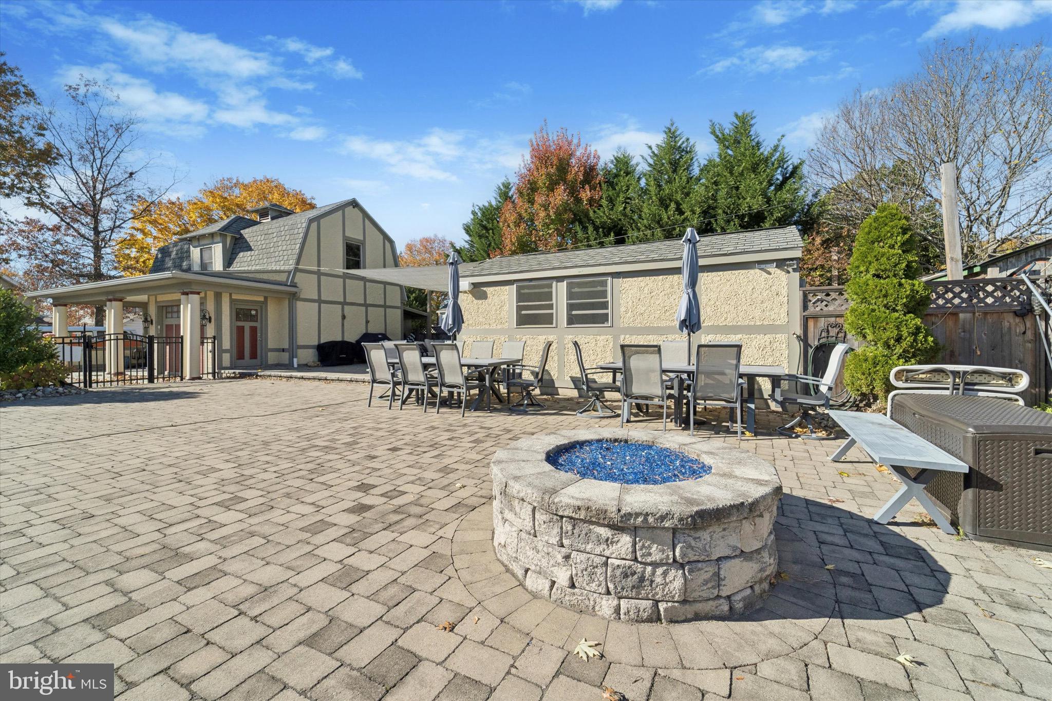 204 East Manoa Road Havertown, PA 19083 - Photo 67 of 80 a view of a house with backyard and sitting area