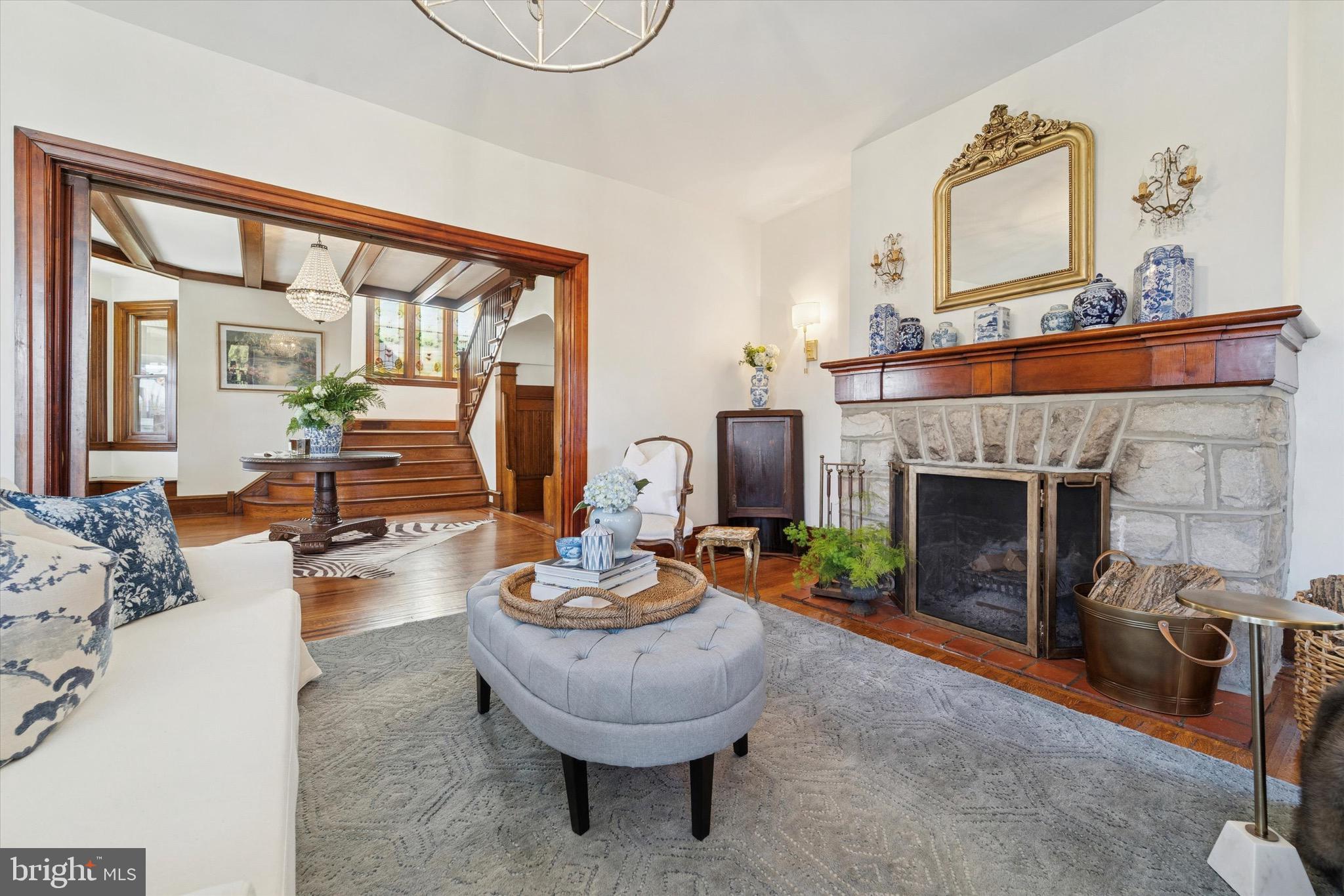 204 East Manoa Road Havertown, PA 19083 - Photo 7 of 80 a living room with furniture and a fireplace