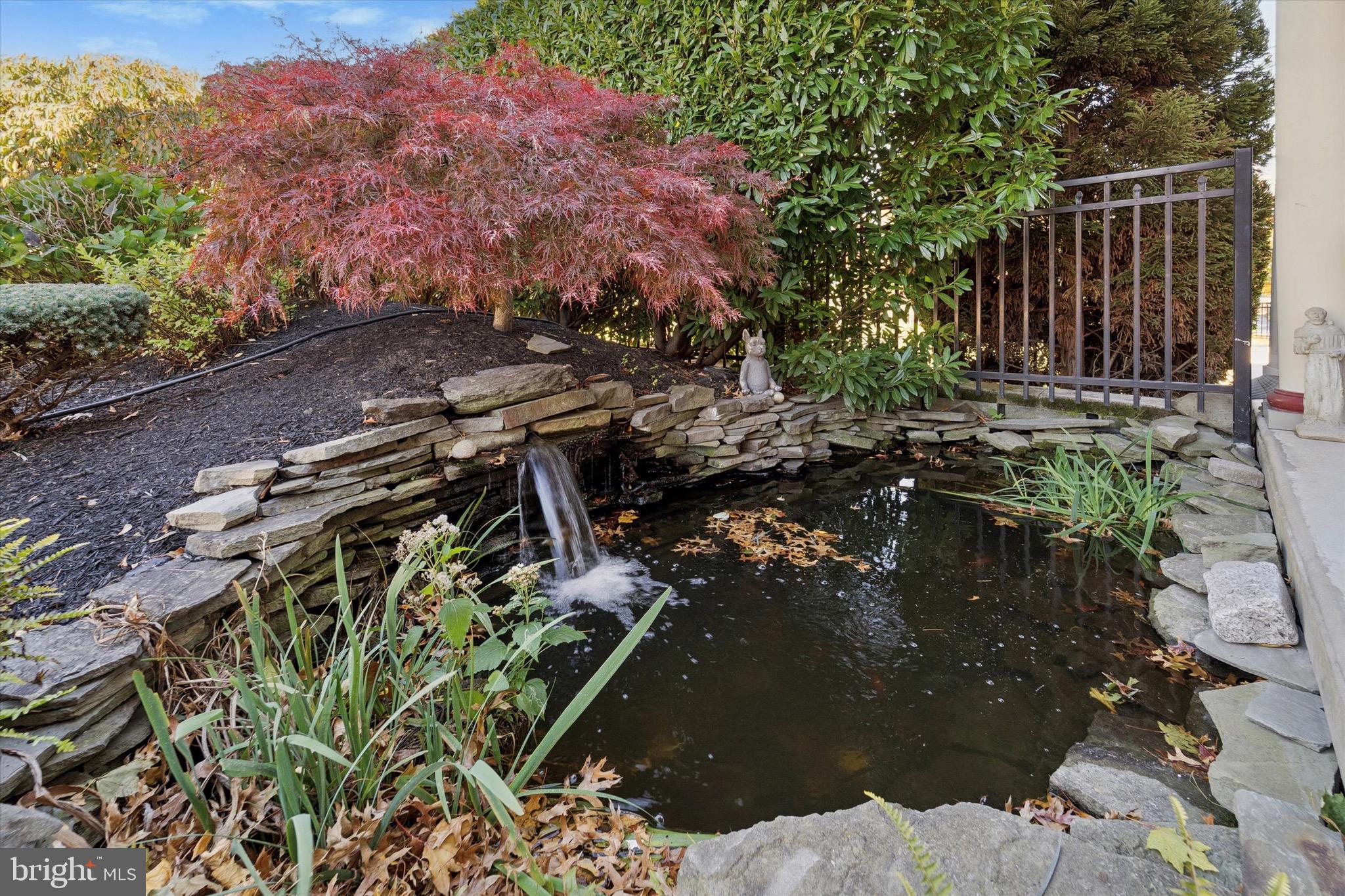 204 East Manoa Road Havertown, PA 19083 - Photo 73 of 80 a backyard of a house with lots of green space