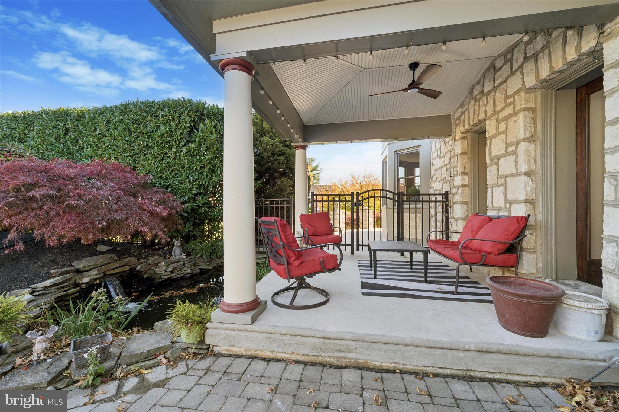 204 East Manoa Road Havertown, PA 19083 - Photo 74 of 80 a building outdoor space with patio furniture and potted plants