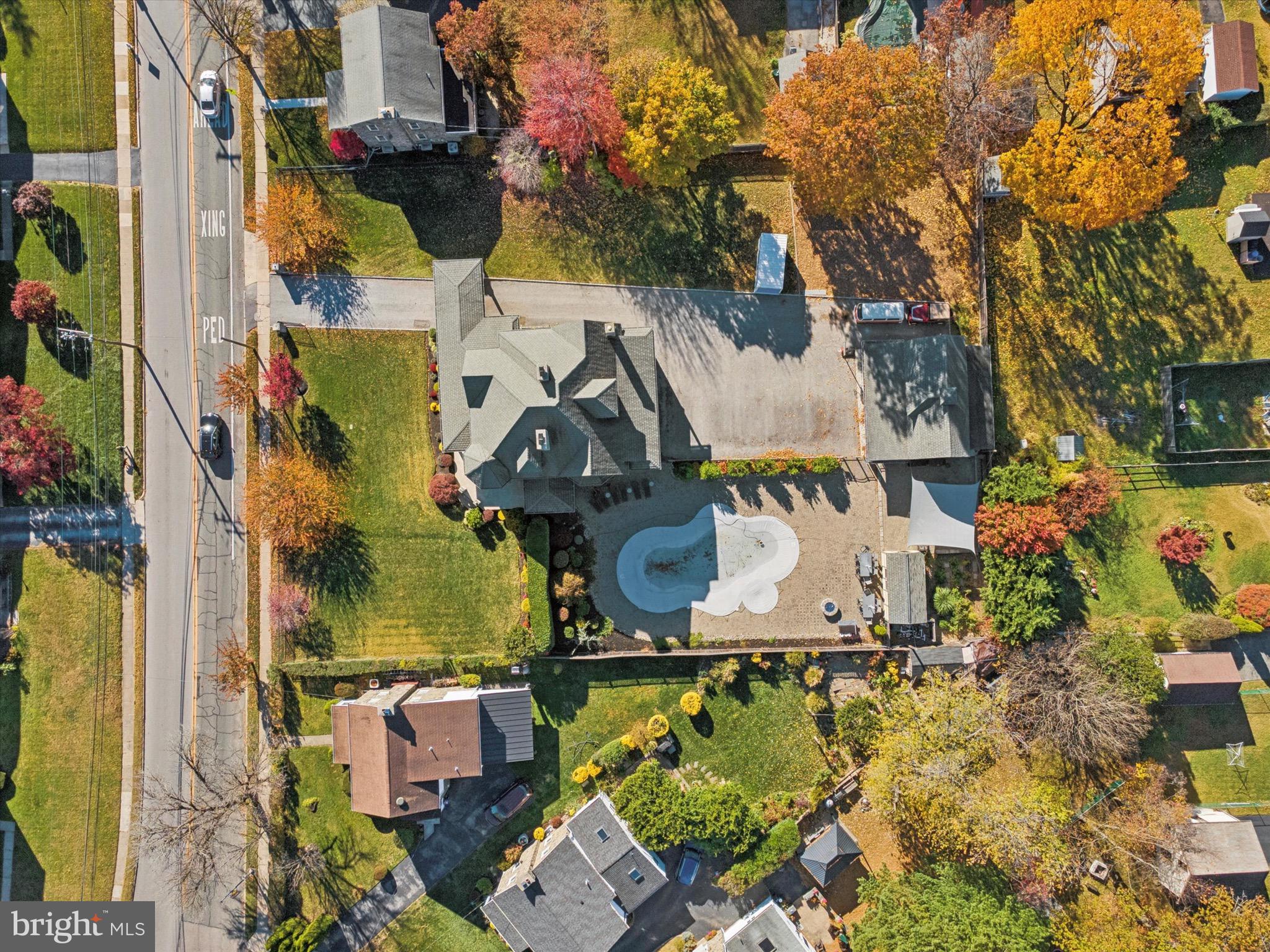 204 East Manoa Road Havertown, PA 19083 - Photo 78 of 80 an aerial view of a house with a swimming pool