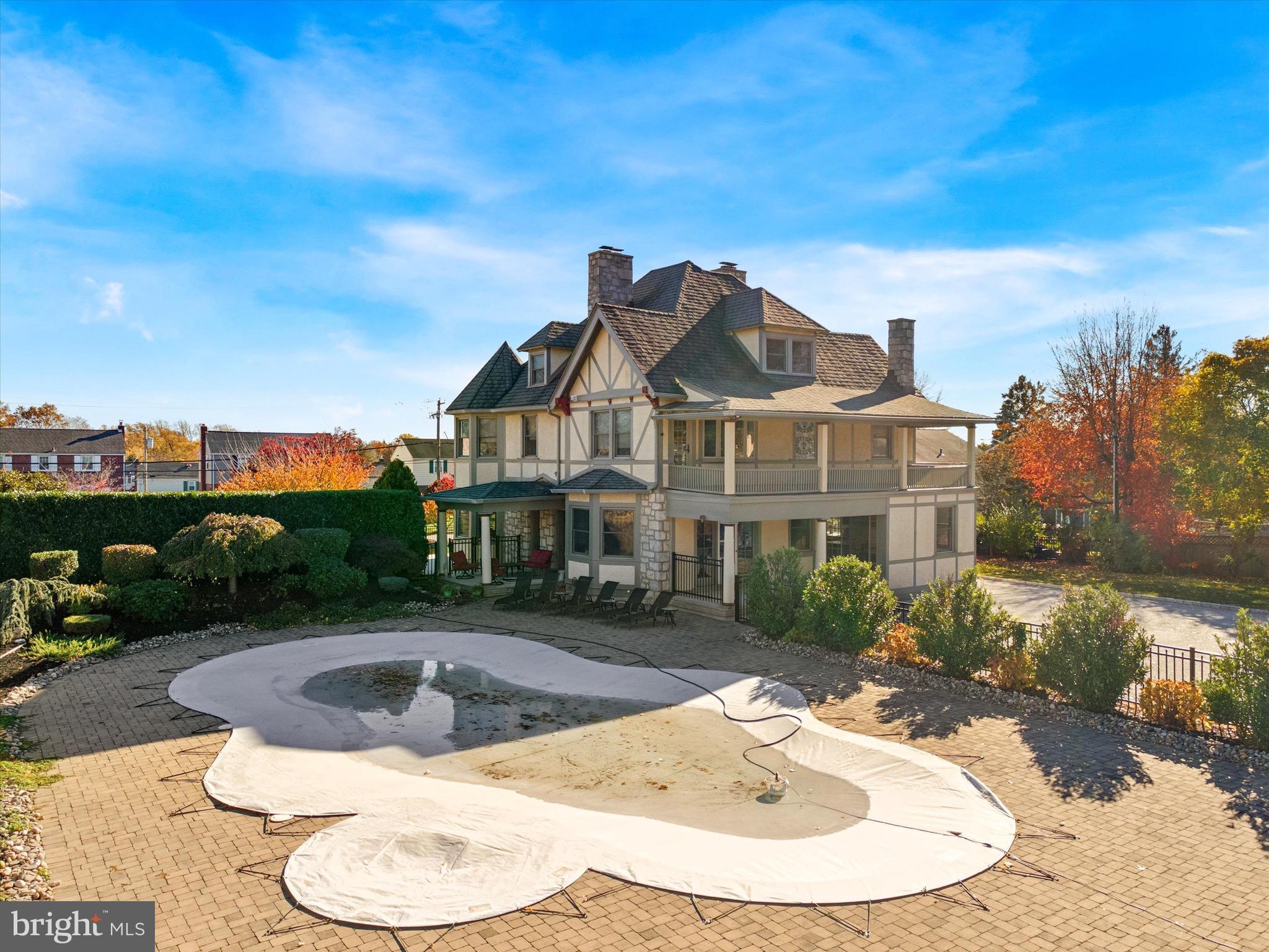 204 East Manoa Road Havertown, PA 19083 - Photo 79 of 80 a view of a house with swimming pool and a yard