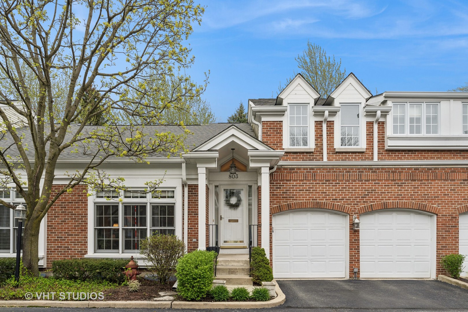 803 Hibbard Road Wilmette, IL 60091 - Photo 1 of 23 a front view of a house with a yard