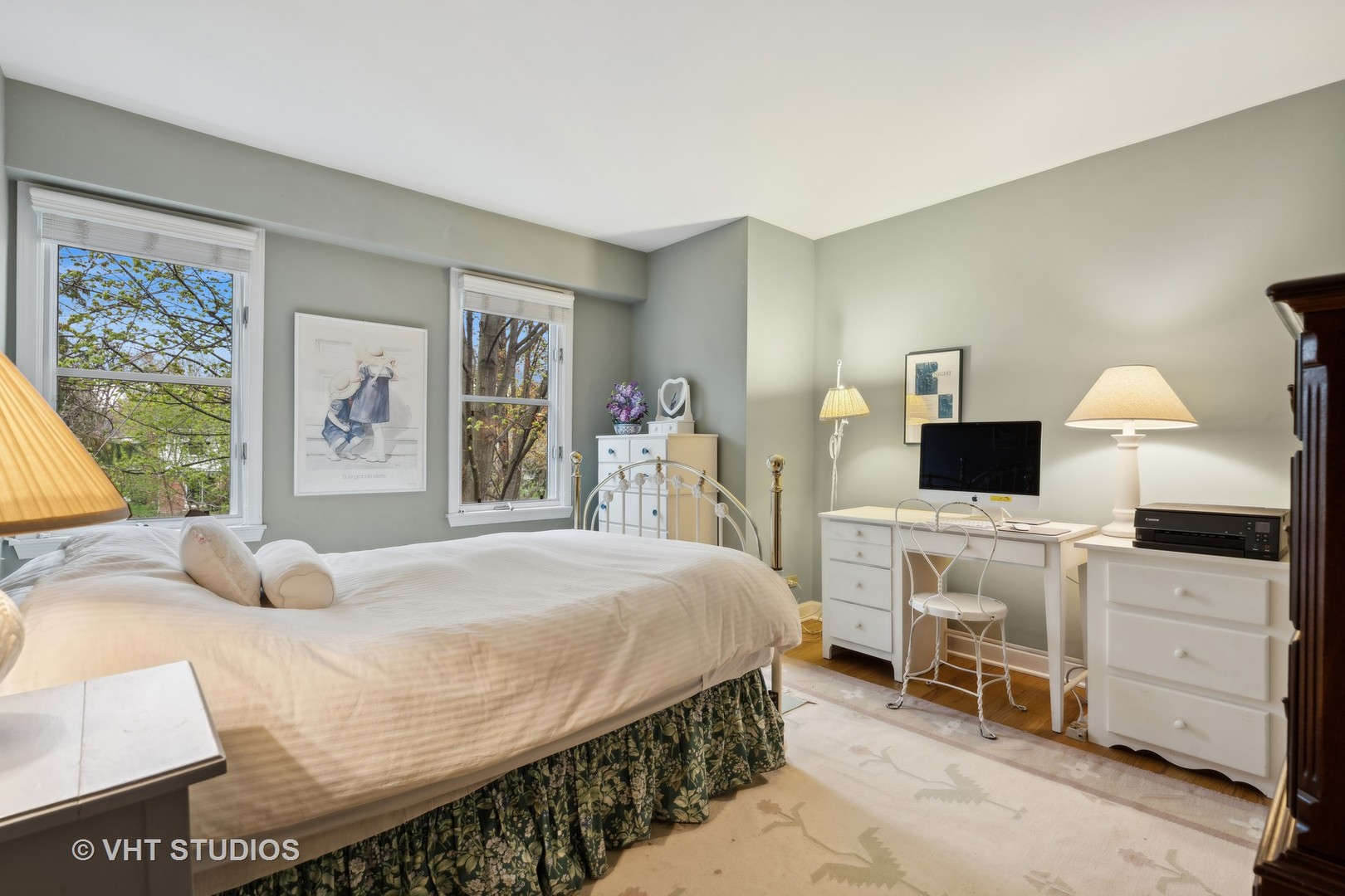 803 Hibbard Road Wilmette, IL 60091 - Photo 14 of 23 a bedroom with a bed and a flat screen tv