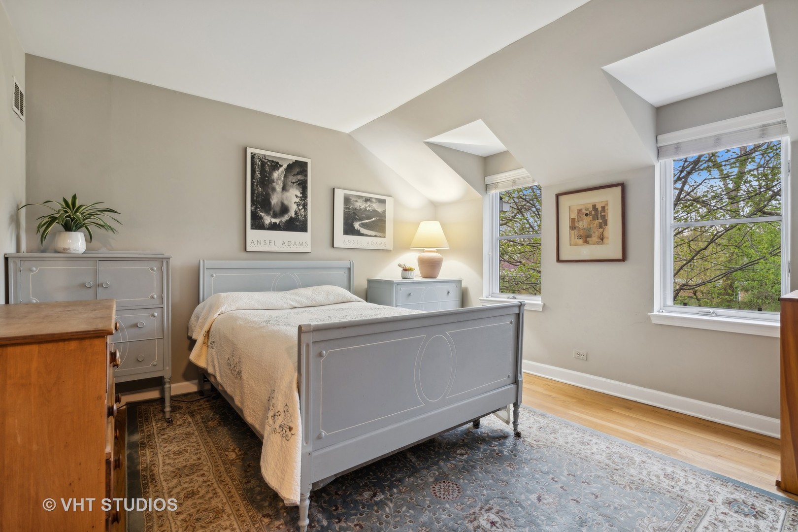 803 Hibbard Road Wilmette, IL 60091 - Photo 15 of 23 a spacious bedroom with a bed and a window