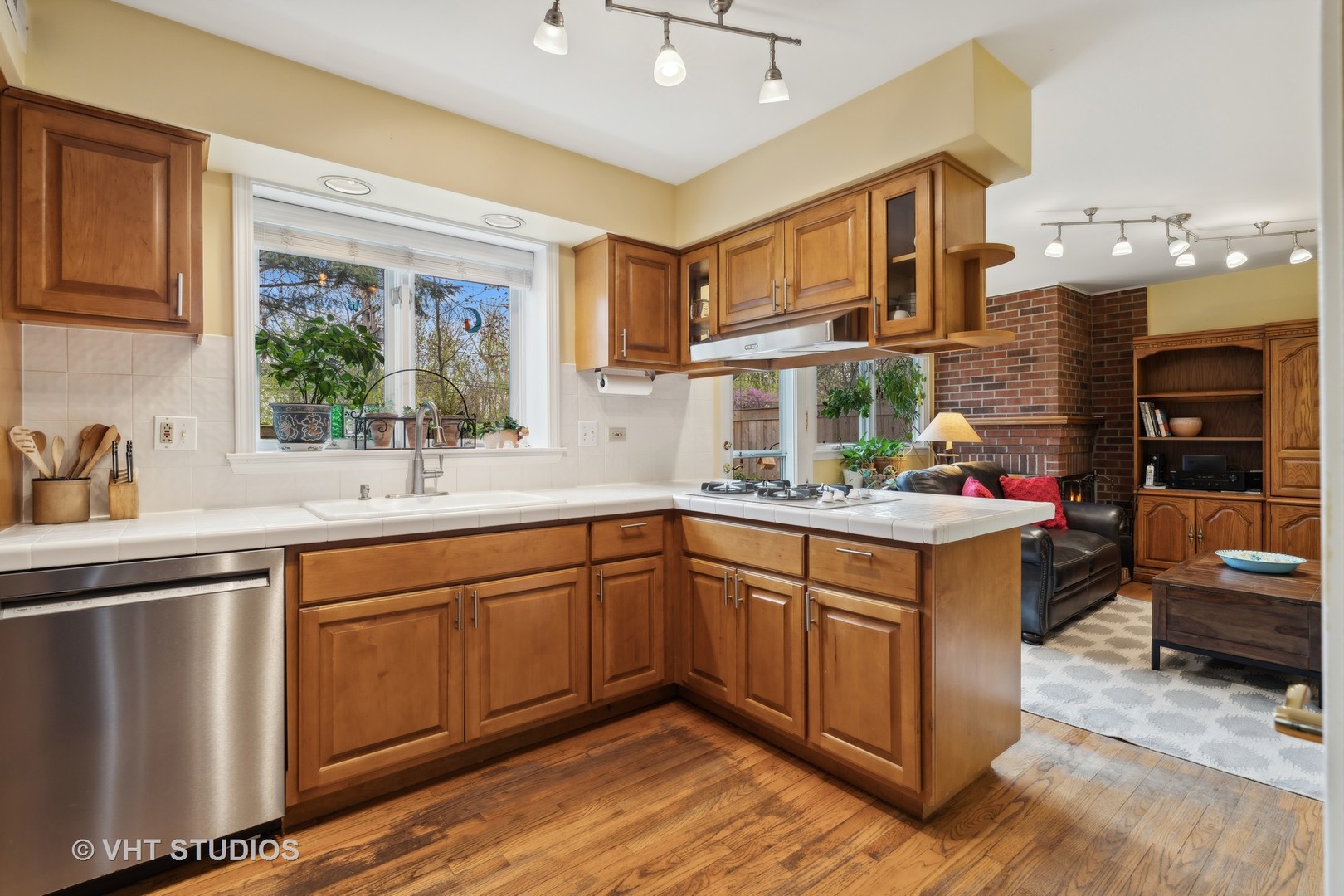 803 Hibbard Road Wilmette, IL 60091 - Photo 8 of 23 a kitchen with a sink cabinets and window