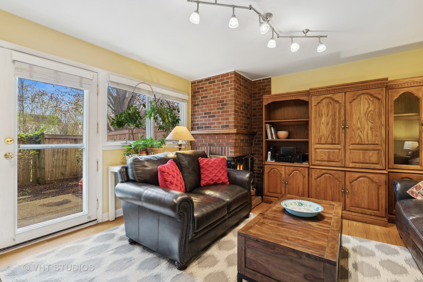 803 Hibbard Road Wilmette, IL 60091 - Photo 9 of 23 a living room with furniture and a floor to ceiling window