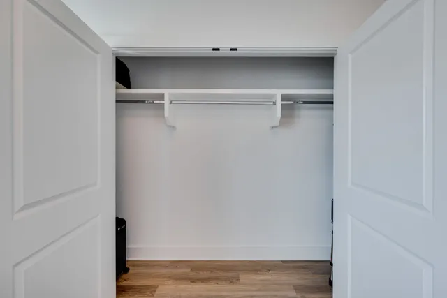 a view of an empty walk in closet