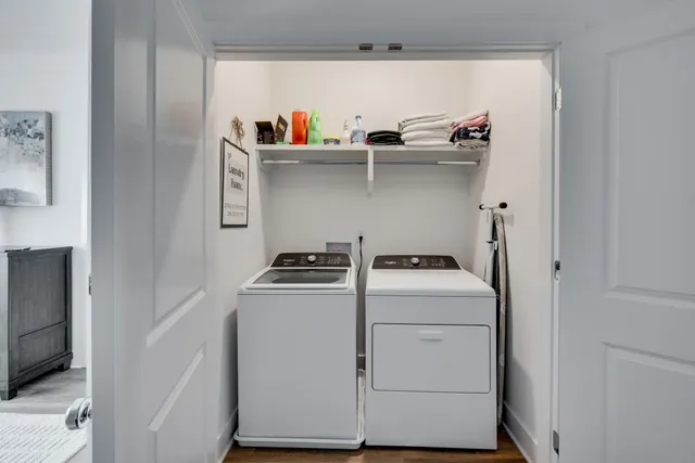 a utility room with dryer and washer