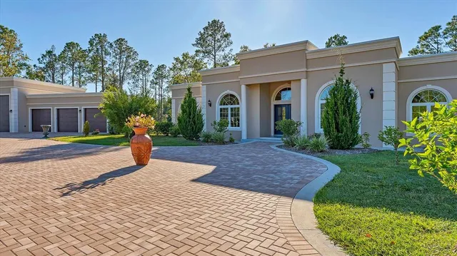 a view of a house with a big yard