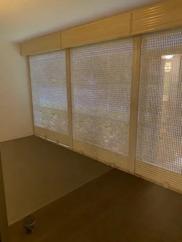 a view of a room has an empty room