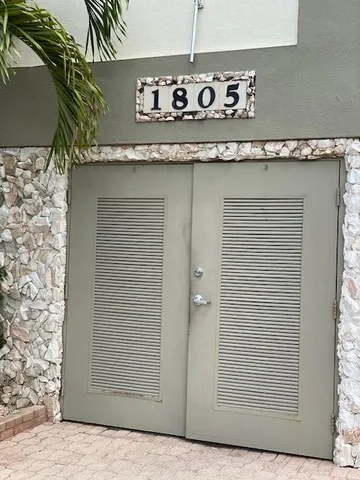 a close view of a door and an outdoor space