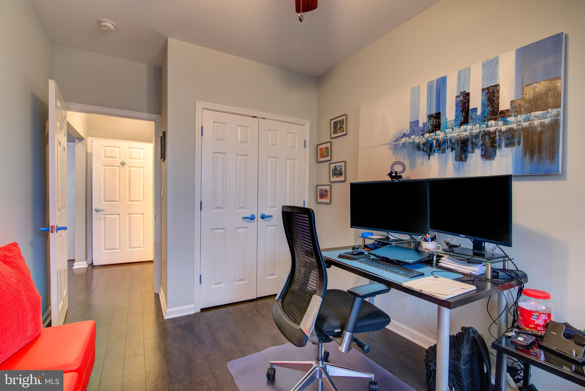 1855 Stratford Park Place, Unit 310 Reston, VA 20190 - Photo 19 of 62 a view of a workspace with furniture and a window