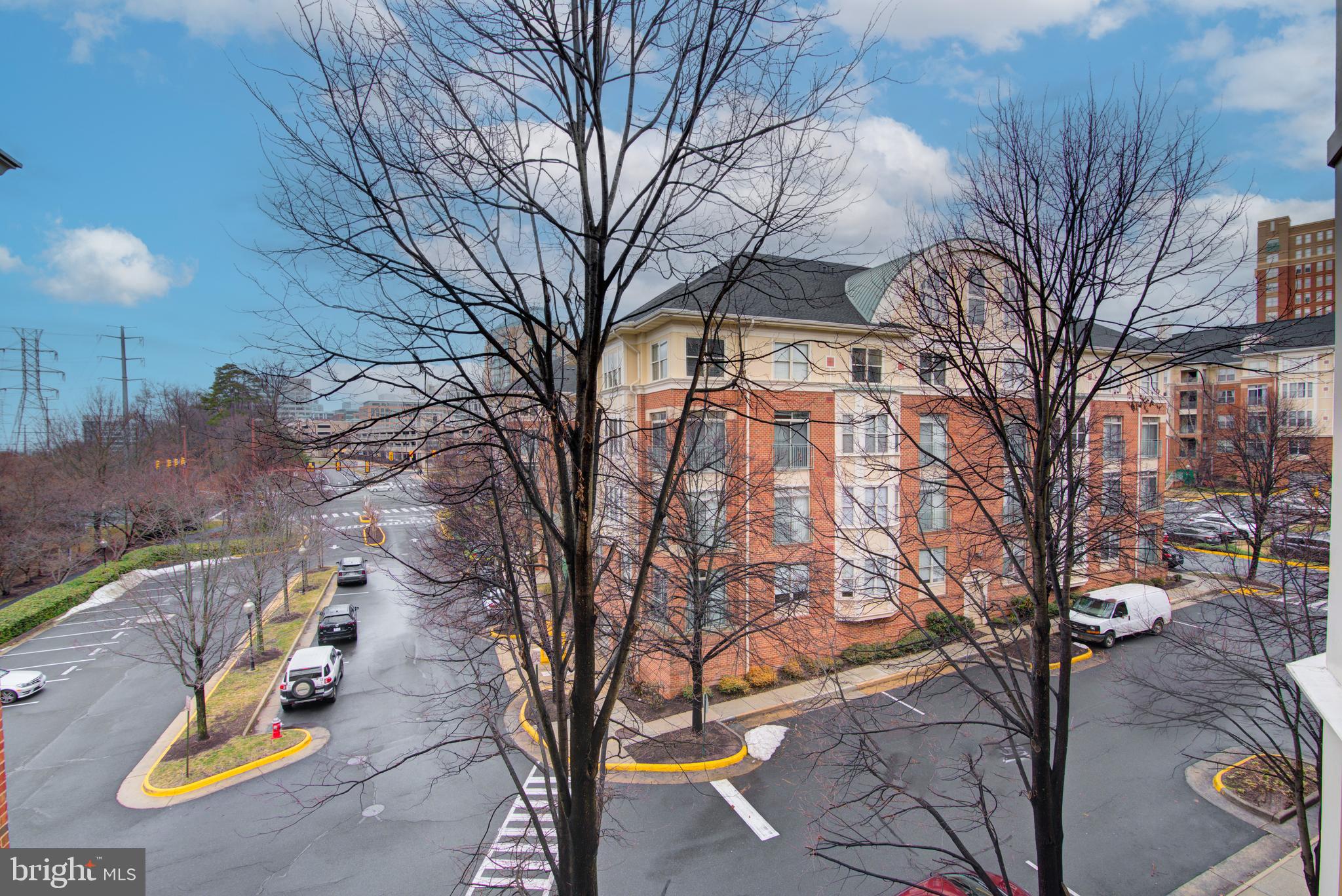 1855 Stratford Park Place, Unit 310 Reston, VA 20190 - Photo 29 of 62 a view of a park with iron fence