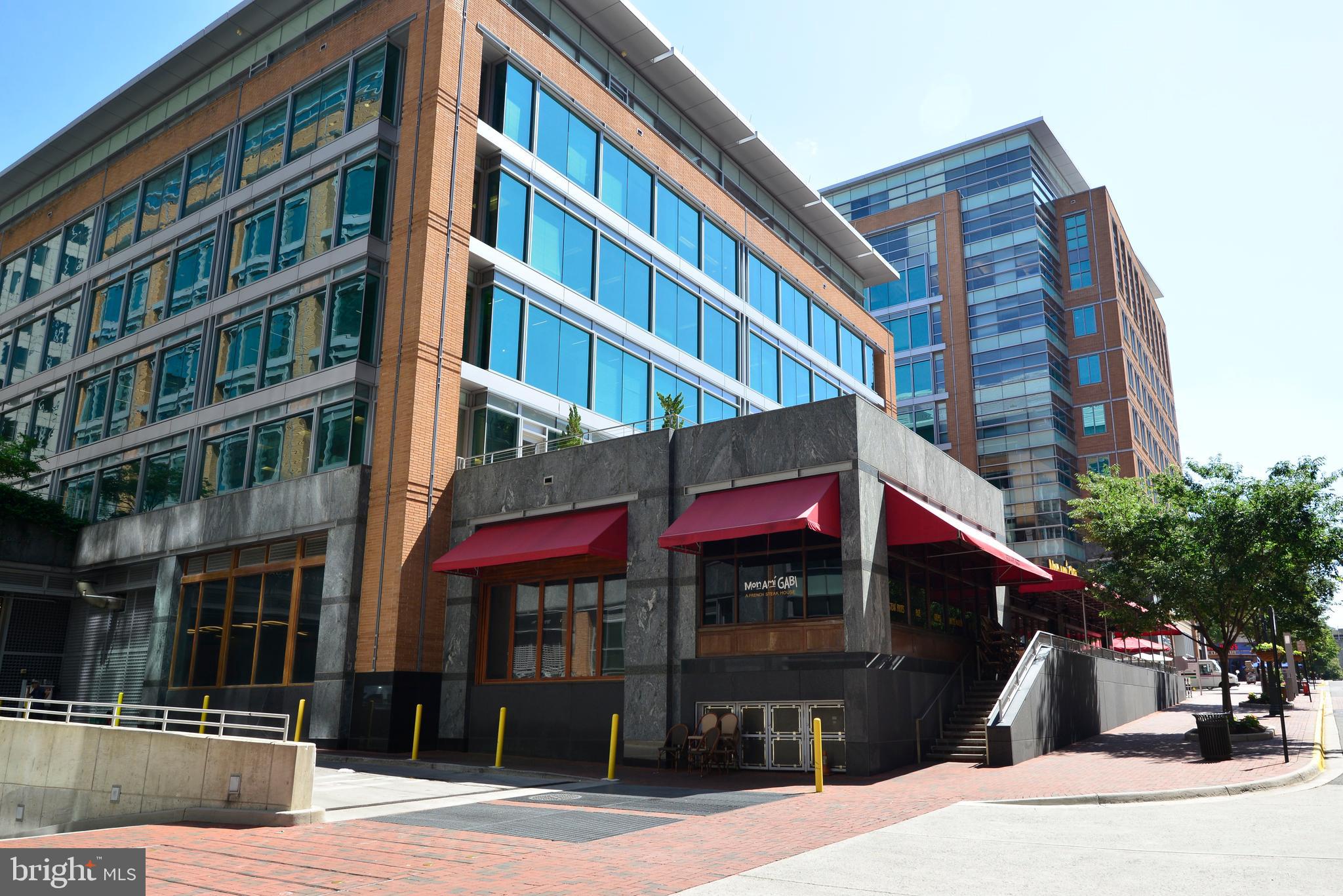 1855 Stratford Park Place, Unit 310 Reston, VA 20190 - Photo 58 of 62 a view of building with street