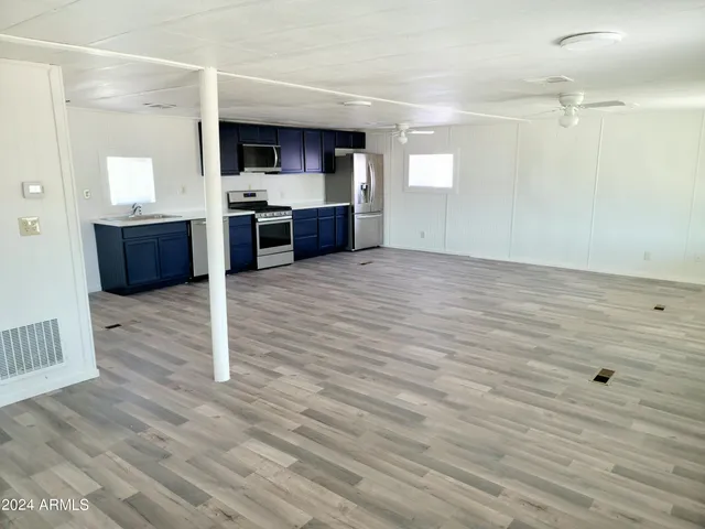 a view of kitchen and microwave