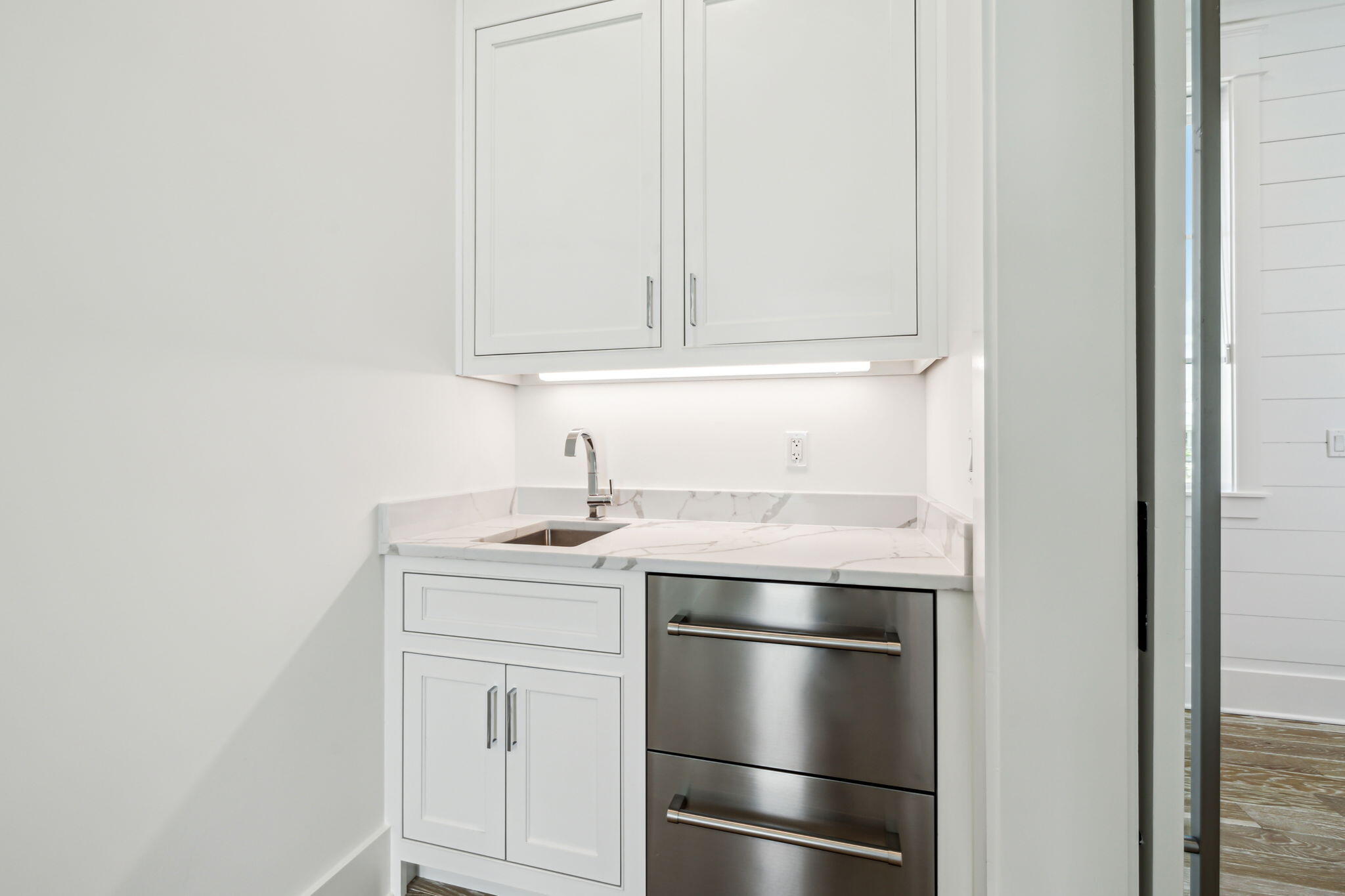 323 Pompano St Inlet Beach Inlet Beach, FL 32461 - Photo 29 of 79 a kitchen with appliances cabinets and a window