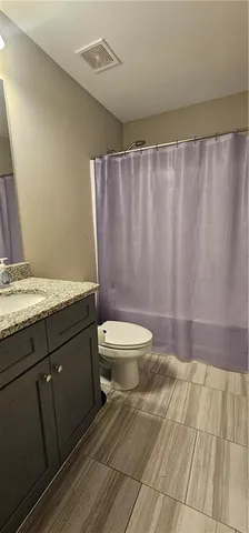 a bathroom with a sink and a toilet