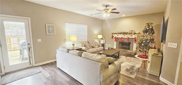 a living room with furniture and a window