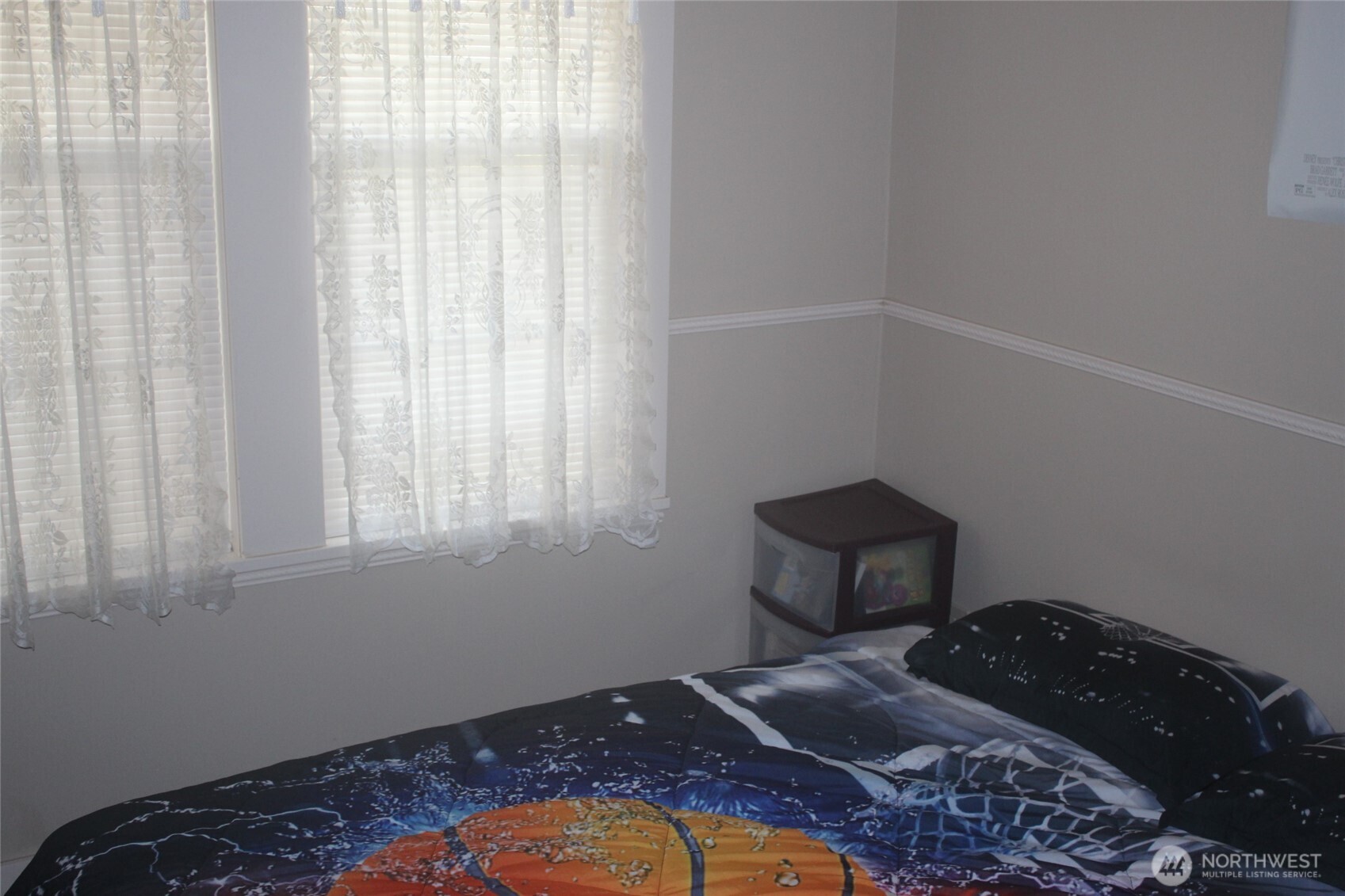 209 East Alder Avenue Ritzville, WA 99169 - Photo 11 of 15 a bedroom with a bed and a window