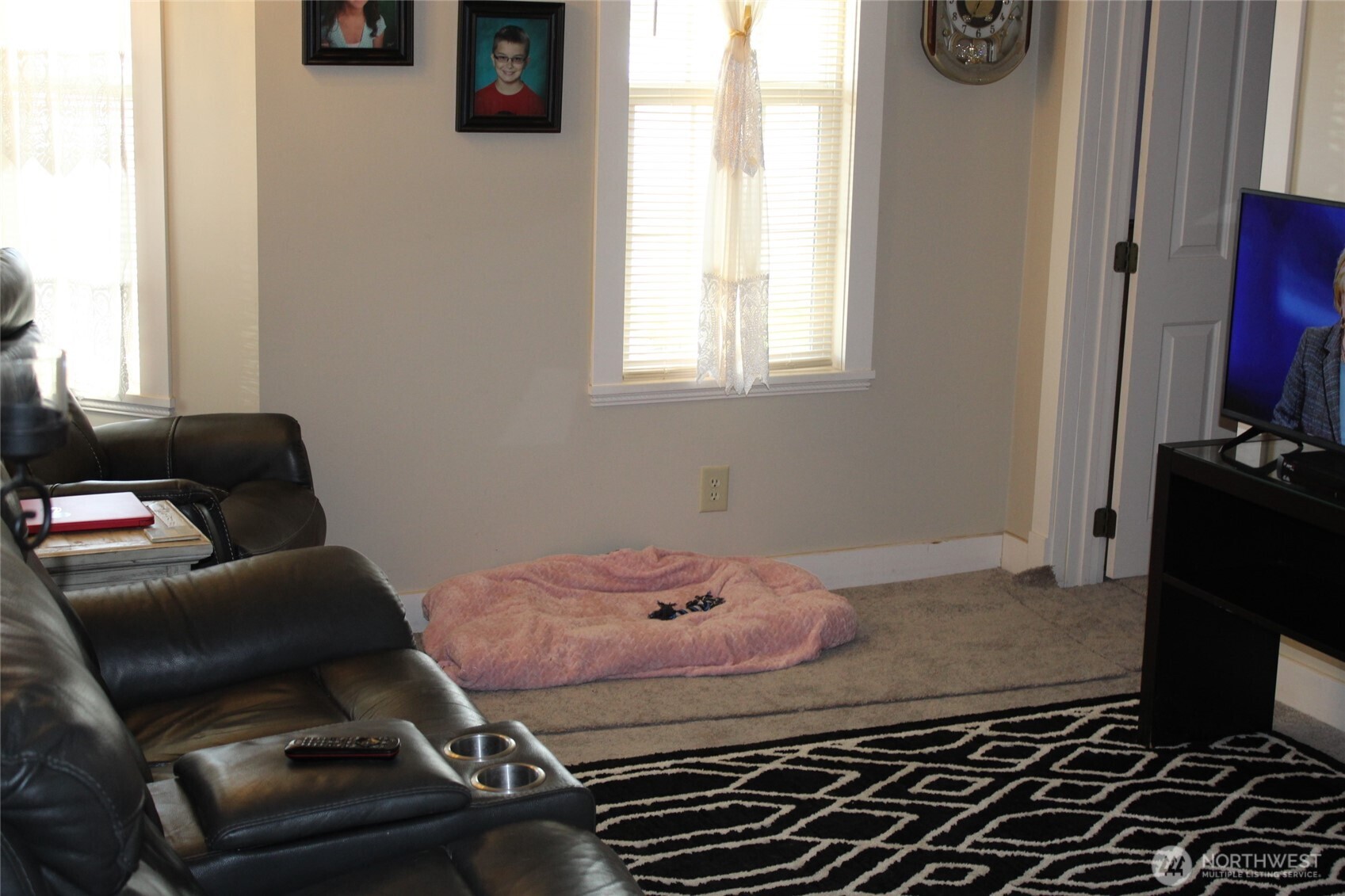 209 East Alder Avenue Ritzville, WA 99169 - Photo 14 of 15 a bedroom with a bed and a window