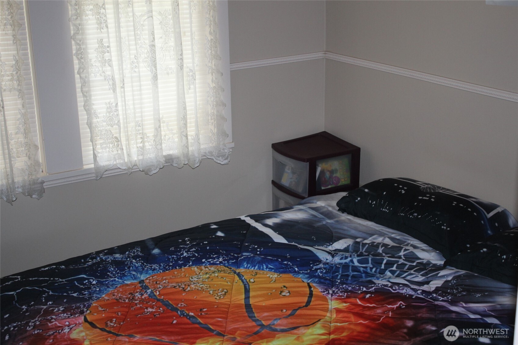 209 East Alder Avenue Ritzville, WA 99169 - Photo 15 of 15 a bedroom with a bed and a window