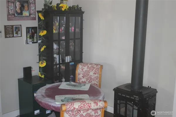 a kitchen with refrigerator and window