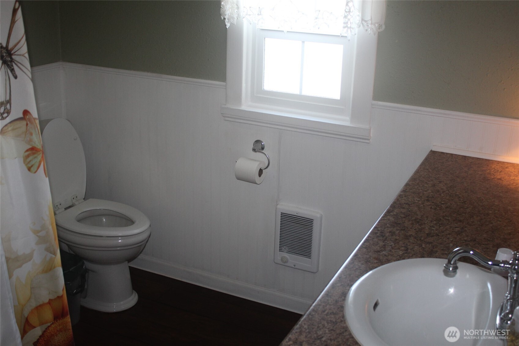 209 East Alder Avenue Ritzville, WA 99169 - Photo 8 of 15 a bathroom with a sink and a toilet