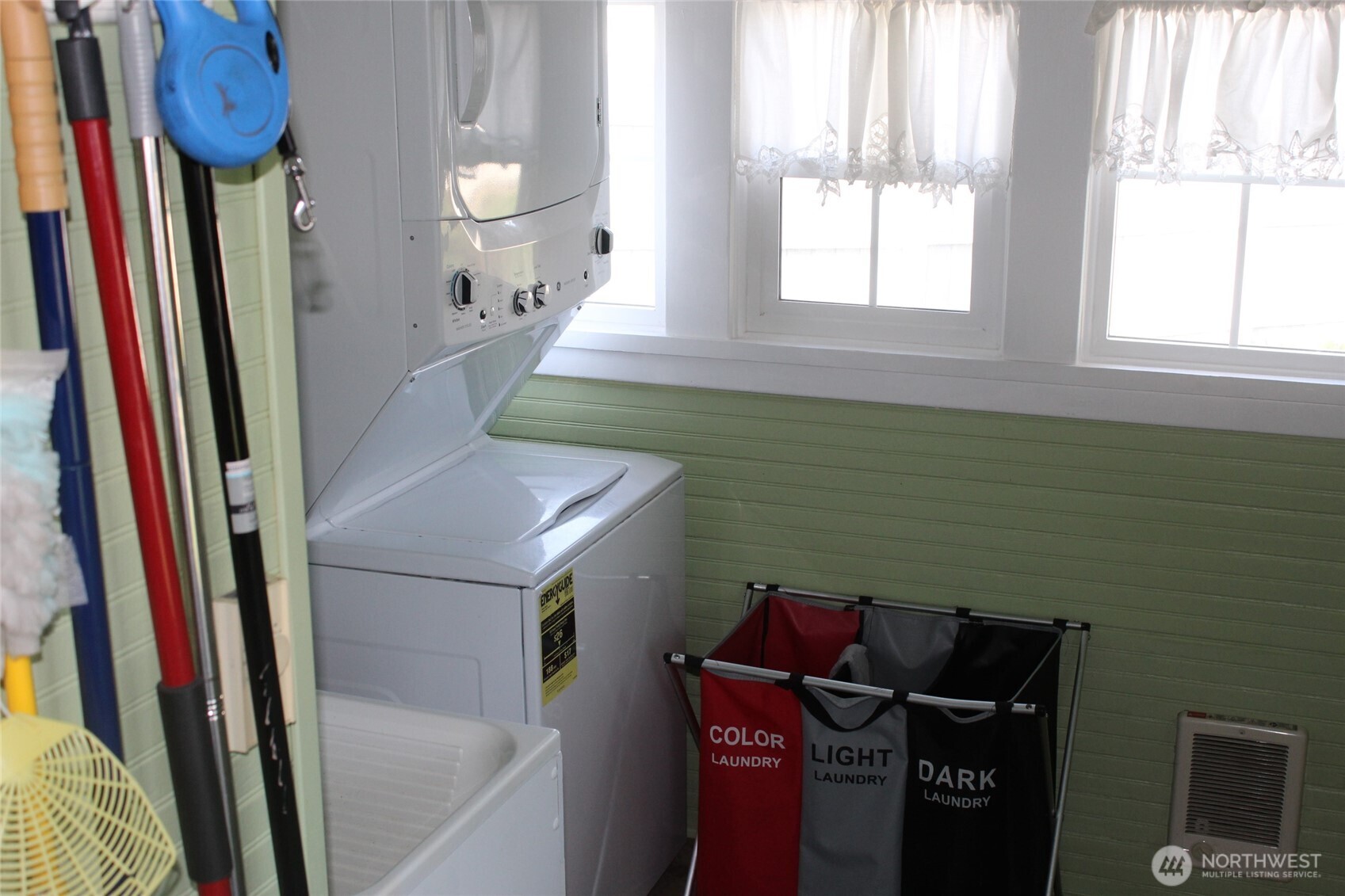 209 East Alder Avenue Ritzville, WA 99169 - Photo 9 of 15 a bathroom with a sink a toilet and a mirror